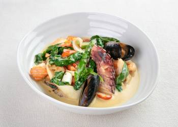 Seafood stew with coconut milk and asparagus