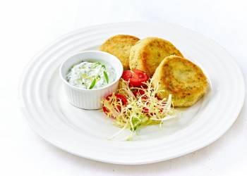 Broccoli vegetable patties with maasdam cheese and yogurt sauce