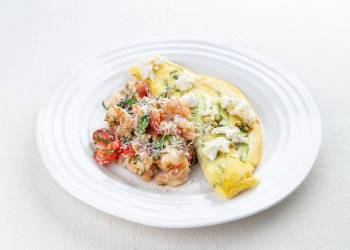 Omelette with asparagus and shrimp, ricotta and cherry tomato salad