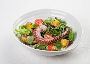 Octopus salad with potatoes and honey dressing