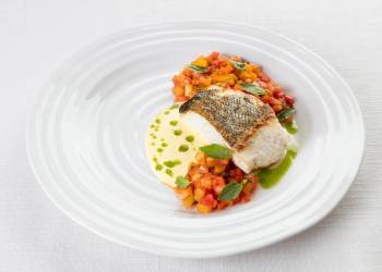 Murmansk cod with and vegetables saffron sauce 
