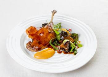 Duck confit with pak-choi and orange puree 